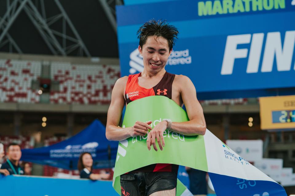 Two-time SEA Games gold medallist Soh Rui Yong crosses the finishing line to clinch his fourth national marathon title at the 2023 Standard Chartered Singapore Marathon. 