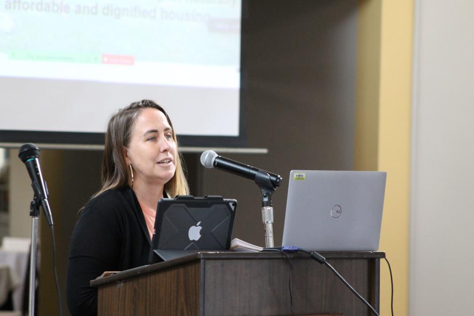 Andrea Golden, co-director of PODER Emma, speaks March 23 at a Leadership Asheville Forum panel on housing in Western North Carolina.