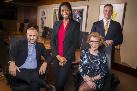 LGBT activists (L-R) Daniel Maury, Lanaya Irvin, Jennifer MacDonald, and Matt Koehler pose for a photograph in New York April 13, 2015. REUTERS/Lucas Jackson