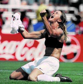 The United States\' Brandi Chastain celebrates after winning the Women\'s World Cup Final July 10. Chastain ripped off her jersey in celebration, leading to controversy about the sports bra she was wearing. AP Photo