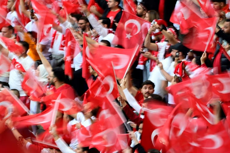 Turkey supporters in colourful support of their country in the last-16 Euro 2024 victory against Austria -- they will be out in force for the quarter-final in Berlin (JOHN MACDOUGALL)