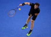 Andy Murray of Britain serves to Novak Djokovic of Serbia during their men's singles final match at the Australian Open 2015 tennis tournament in Melbourne February 1, 2015. REUTERS/Carlos Barria