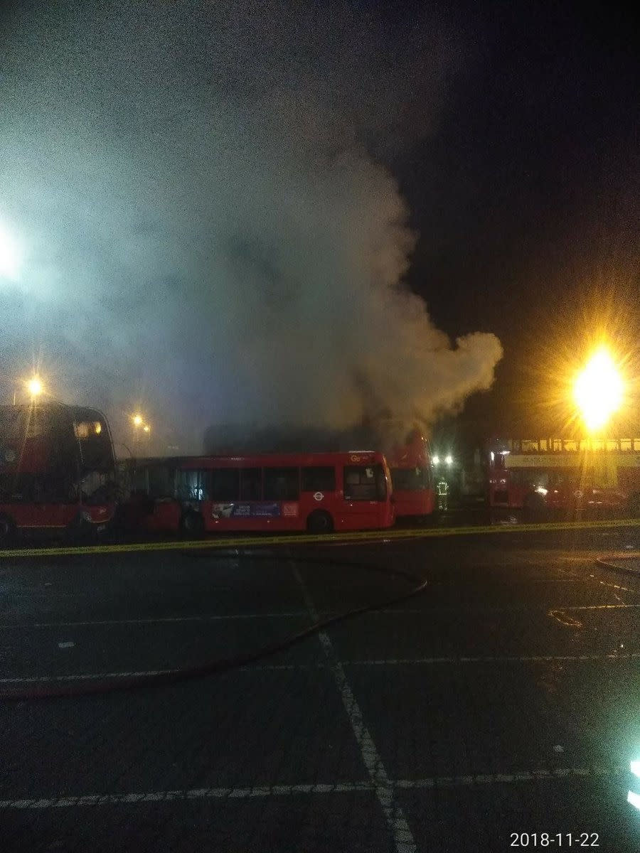 <em>At least 11 buses were engulfed in the blaze at the depot in Orpington, London Fire Brigade said (Picture: PA)</em>