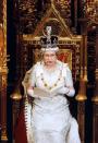 <p>Dressed in her full regalia, The Queen sits in the House of Lords for the state opening of parliament. (PA Archive) </p>