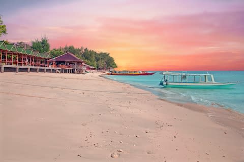 The Gili islands are off-limits, but much of southern Lombok remains open for business - Credit: GETTY