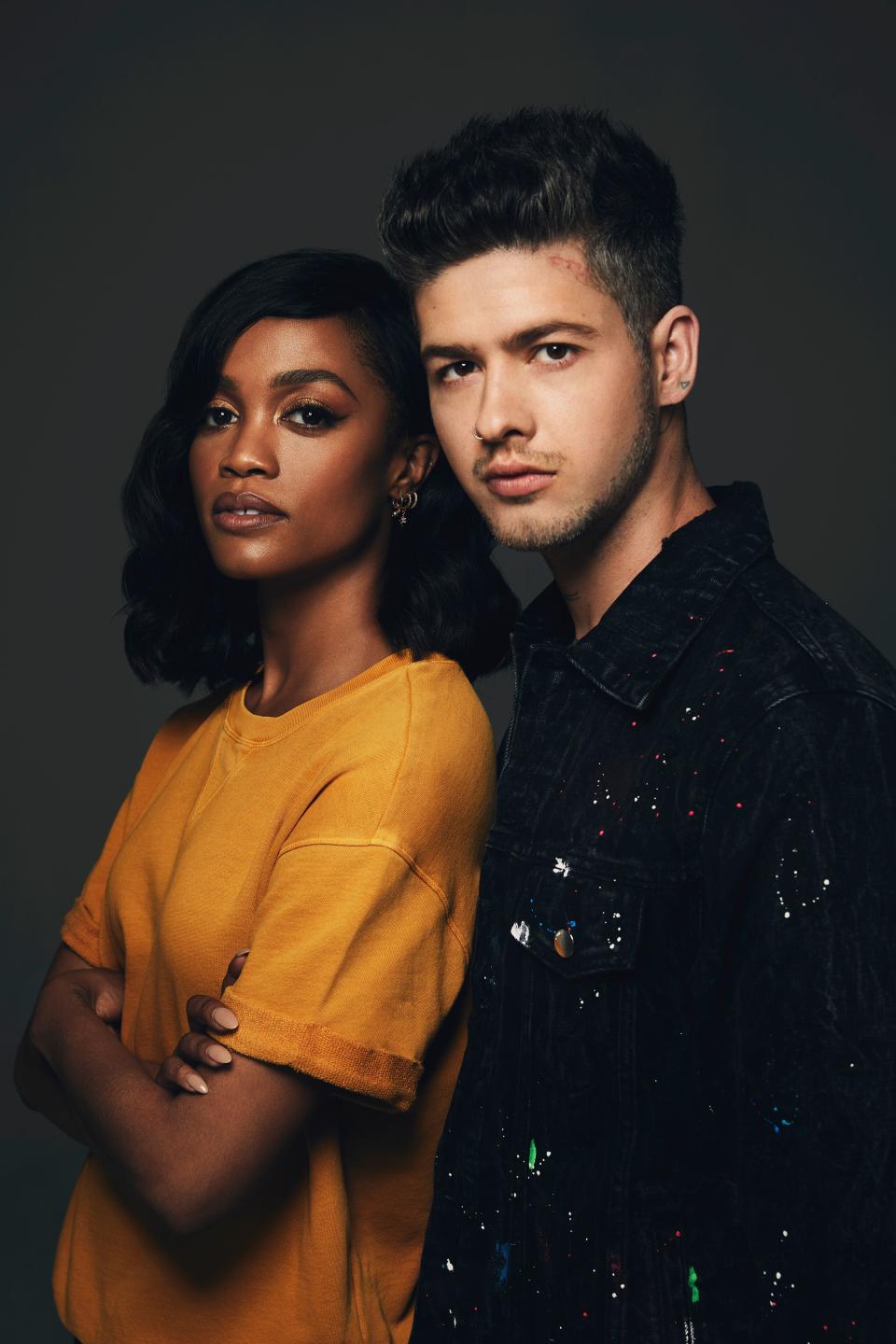 'The Bachelorette' star Rachel Lindsay and artist Travis Mills. (Photo: MTV)