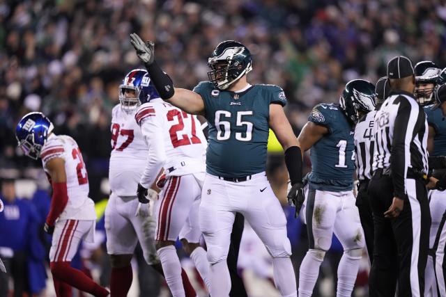 Philadelphia Eagles offensive tackle Lane Johnson (65) reacts after running back Kenneth Gainwell (14) rushed for a first down against the New York Giants during the second half of an NFL divisional round playoff football game, Saturday, Jan. 21, 2023, in Philadelphia. (AP Photo/Matt Slocum)