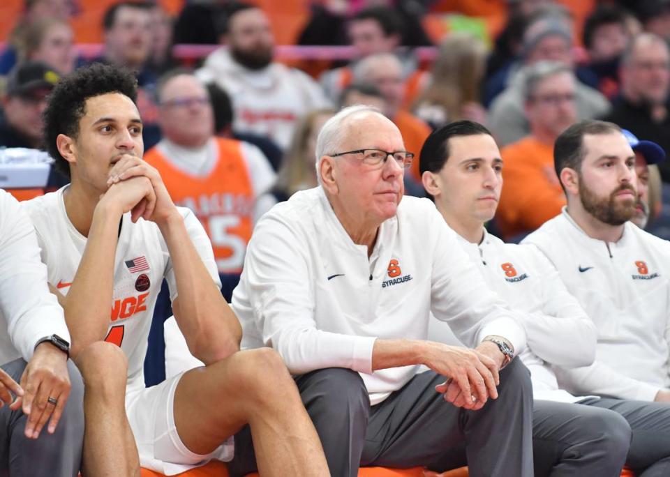 Syracuse Orange head coach Jim Boeheim and center Jesse Edwards (left) watch play in the second half against the Georgia Tech Yellow Jackets at the JMA Wireless Dome on Feb. 28, 2023.