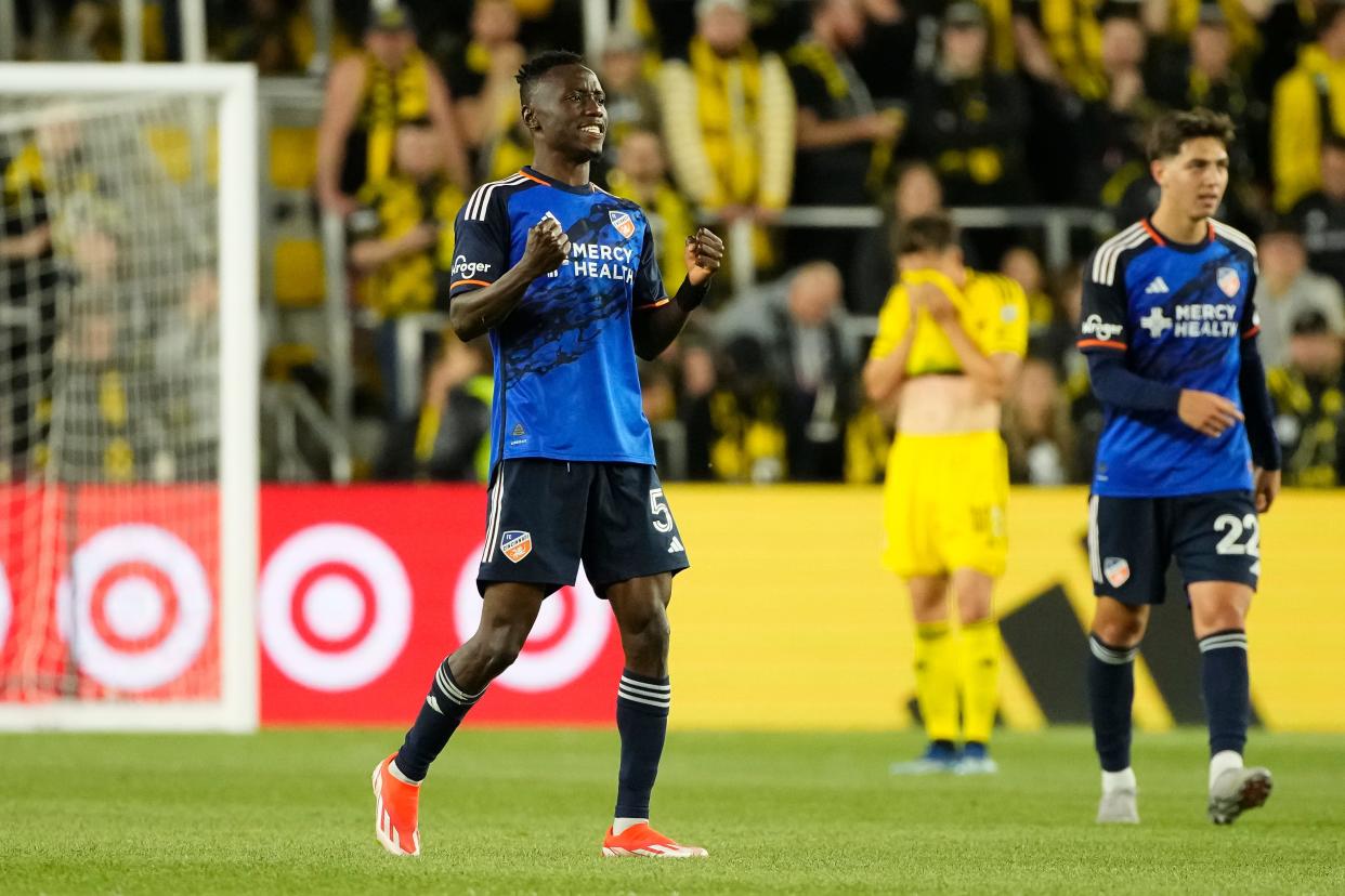 FC Cincinnati midfielder Obinna Nwobodo celebrates after beating the Crew on Saturday.