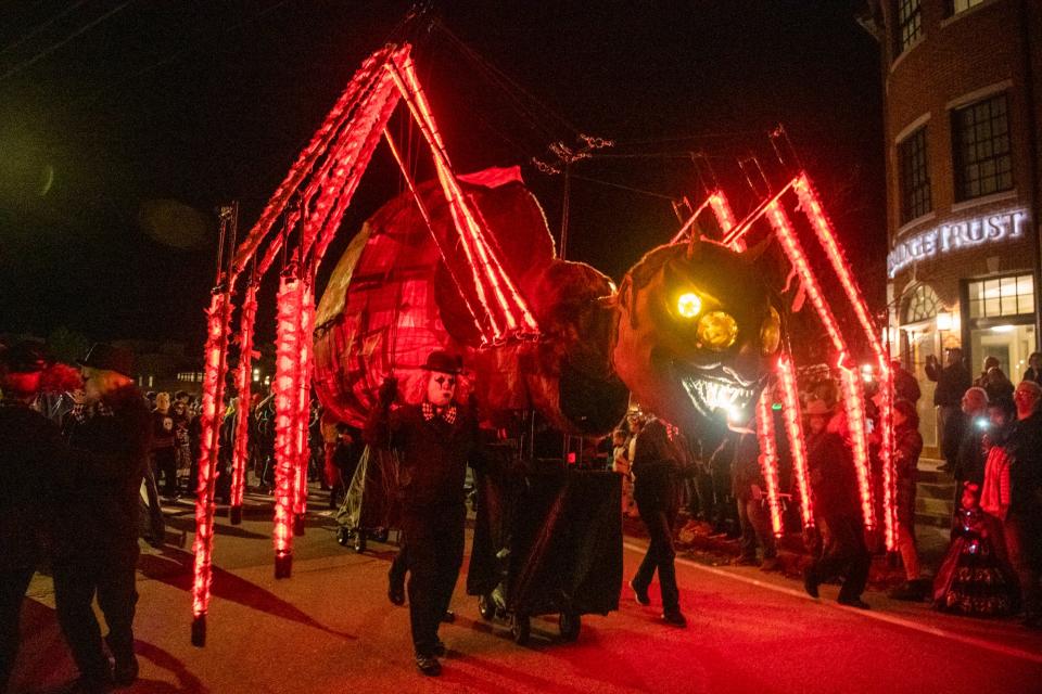 People gather downtown to watch the 26th Portsmouth Halloween Parade Sunday, Oct. 31, 2021.