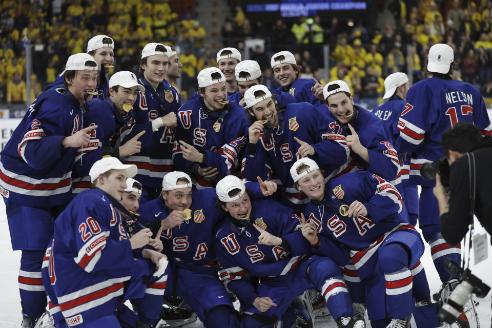 USA players celebrate winning the IIHF World Junior Championship ice hockey final match between Sweden and USA at Scandinavium in Gothenburg, Sweden, Friday Jan. 5, 2024. (Bjorn Larsson Rosvall/TT via AP)