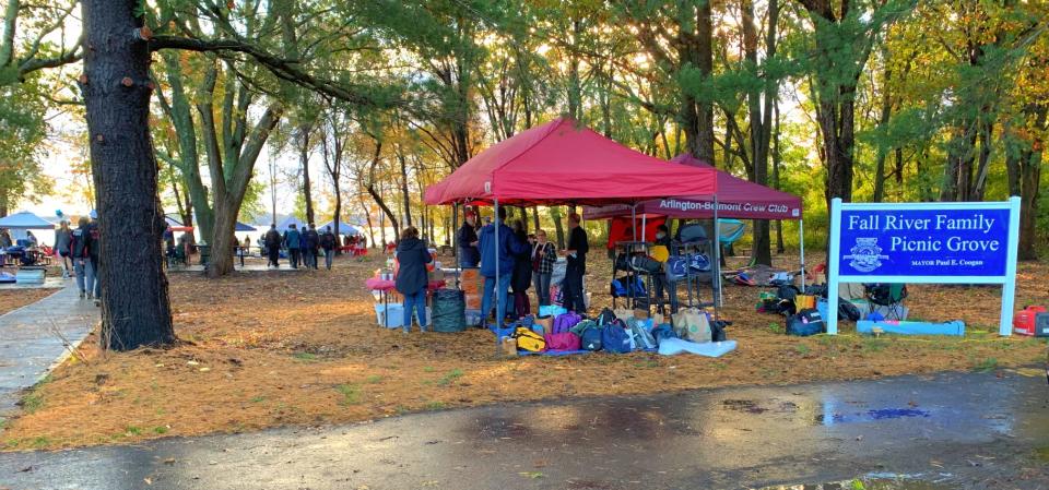 Family and support crews pitch tents at the Fall River Family Picnic Grove near South Watuppa Pond for the Massachusetts Public School Rowing Association’s Fall Championship Regatta on Oct. 31, 2021.
