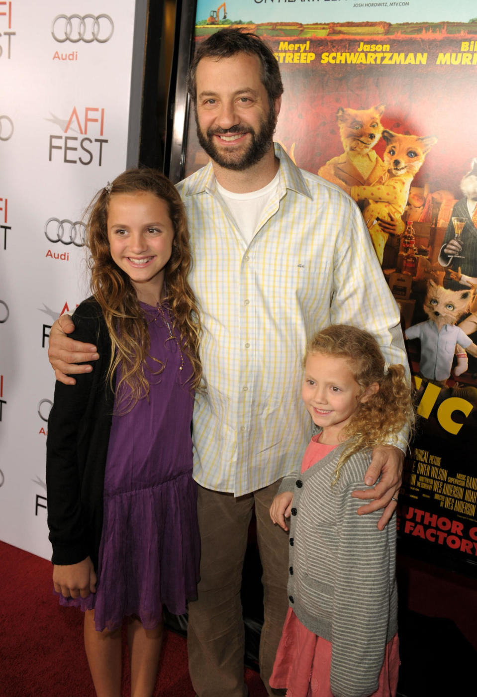 <p>The girls with their dad at the premiere of “The Fantastic Mr. Fox.”<i> (Photo by Kevin Winter/Getty Images for AFI)</i></p>