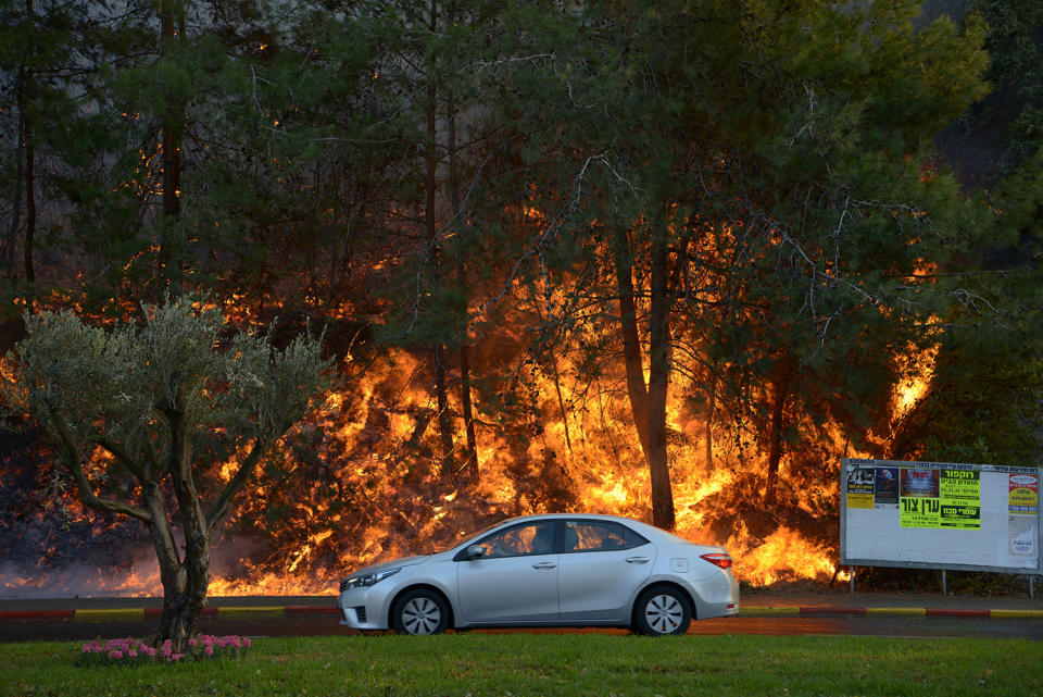 Massive wildfires tear across Israel