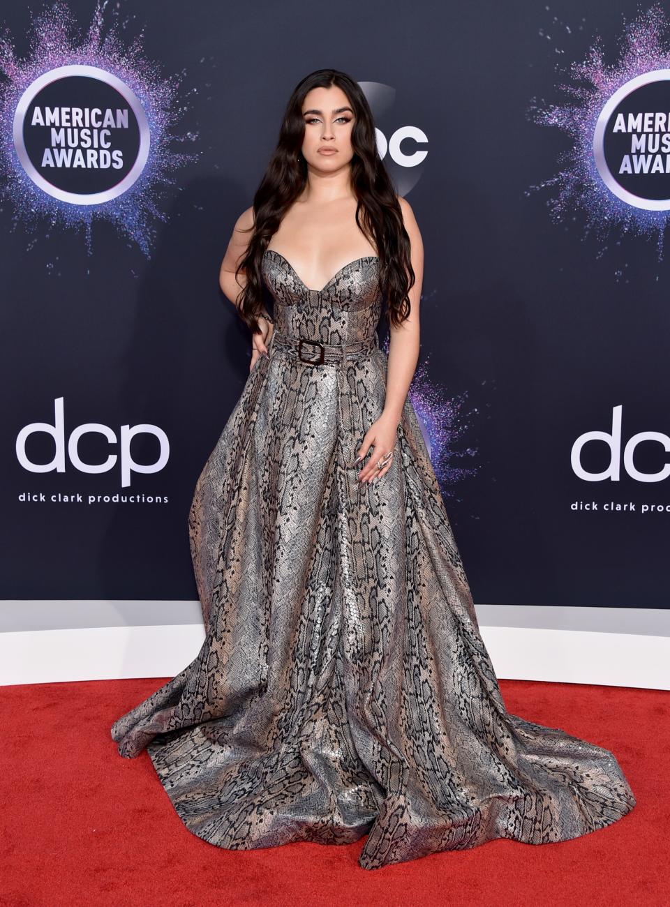 <h1 class="title">Lauren Jauregui in Stuart Weitzman shoes</h1><cite class="credit">Photo: Getty Images</cite>