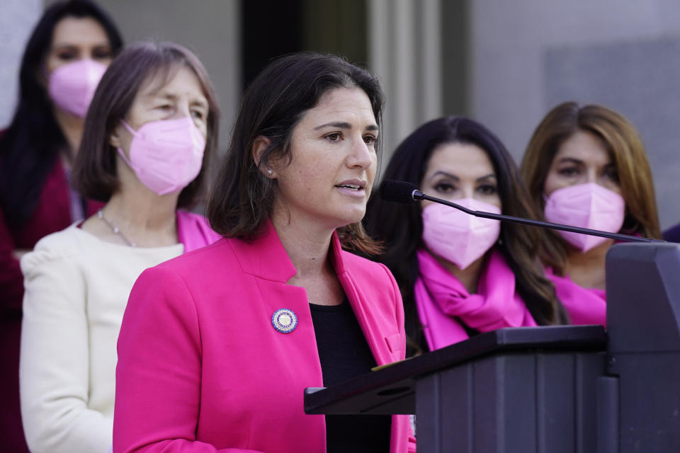 FILE - Assemblywoman Rebecca Bauer-Kahn,, D-Orinda, flanked by other members of the Legislative Women's Caucus to discuss the groups efforts to strengthen women's reproductive rights at the Capitol in Sacramento, Calif., Thursday, Jan. 20, 2022. State-by-state battles over the future of abortion in the U.S. are setting up across the country as lawmakers in Republican-led states propose new restrictions modeled on laws passed in Texas and Mississippi even as some Democratic-controlled states work to preserve access. (AP Photo/Rich Pedroncelli, File)