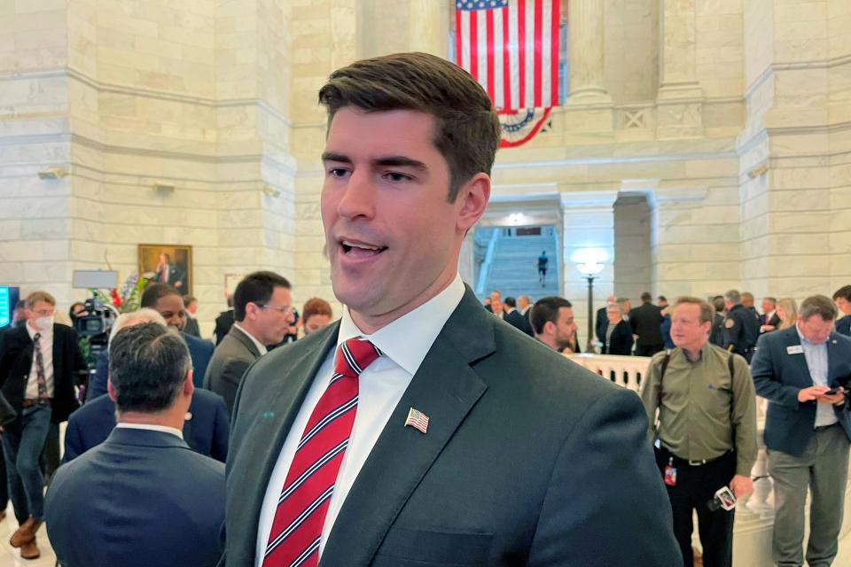 Former NFL football player Jake Bequette speaks to reporters at the Arkansas State Capitol in Little Rock, Arkansas on Feb. 22, 2022, after filing paperwork to run for the U.S. Senate.