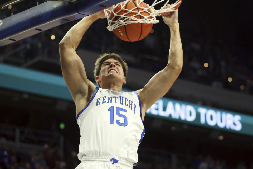 Kentucky's Reed Sheppard dunks during the first half of an NCAA college basketball game against New Mexico State in Lexington, Ky., Monday, Nov. 6, 2023. (AP Photo/James Crisp)