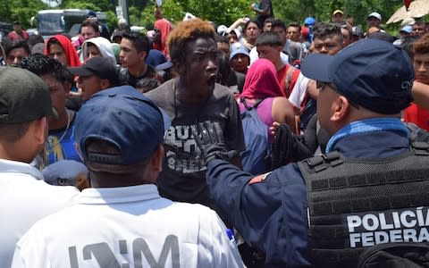 Central American migrants are detained by members of the National Institute of Migration (INAMI) and federal police in Tapachula, Chiapas, Mexico, 05 June 2019 - Credit: Rex