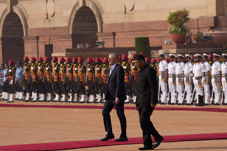 Australian Prime Minister Anthony Albanese inspects a joint military guard of honour during his ceremonial reception at the Indian presidential palace, in New Delhi, India, Friday, March 10, 2023. Australia is striving to strengthen security cooperation with India and also deepen economic and cultural ties, Prime Minister Anthony Albanese said on Friday. (AP Photo/Manish Swarup)