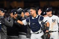 Oct 17, 2017; Bronx, NY, USA; New York Yankees designated hitter Gary Sanchez (24) celebrates with teammates after defeating the Houston Astros in game four of the 2017 ALCS playoff baseball series at Yankee Stadium. Yankees won 6-4. Mandatory Credit: Robert Deutsch-USA TODAY Sports