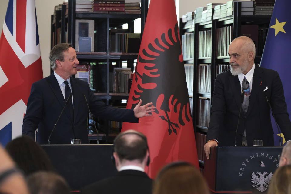 British Foreign Secretary David Cameron, left, and Albania's Prime Minister Edi Rama hold a news conference with in Tirana, Albania, Wednesday, May 22, 2024. Cameron hailed progress in a U.K.-Albania joint effort to cut illegal migration. (AP Photo/Vlasov Sulaj)