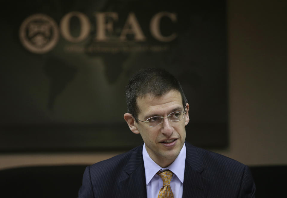 Office of Foreign Assets Control (OFAC) Director Adam Szubin and his staff (not pictured) meet at the U.S. Treasury Department in Washington March 26, 2014. Before discussing possible next steps against Russia over its annexation of Crimea, Szubin thanked his team for putting in a string of sleepless nights to devise sanctions against senior Russian officials and associates of President Vladimir Putin. Picture taken March 26, 2014. To match Insight USA-SANCTIONS/ REUTERS/Gary Cameron  (UNITED STATES - Tags: BUSINESS POLITICS)