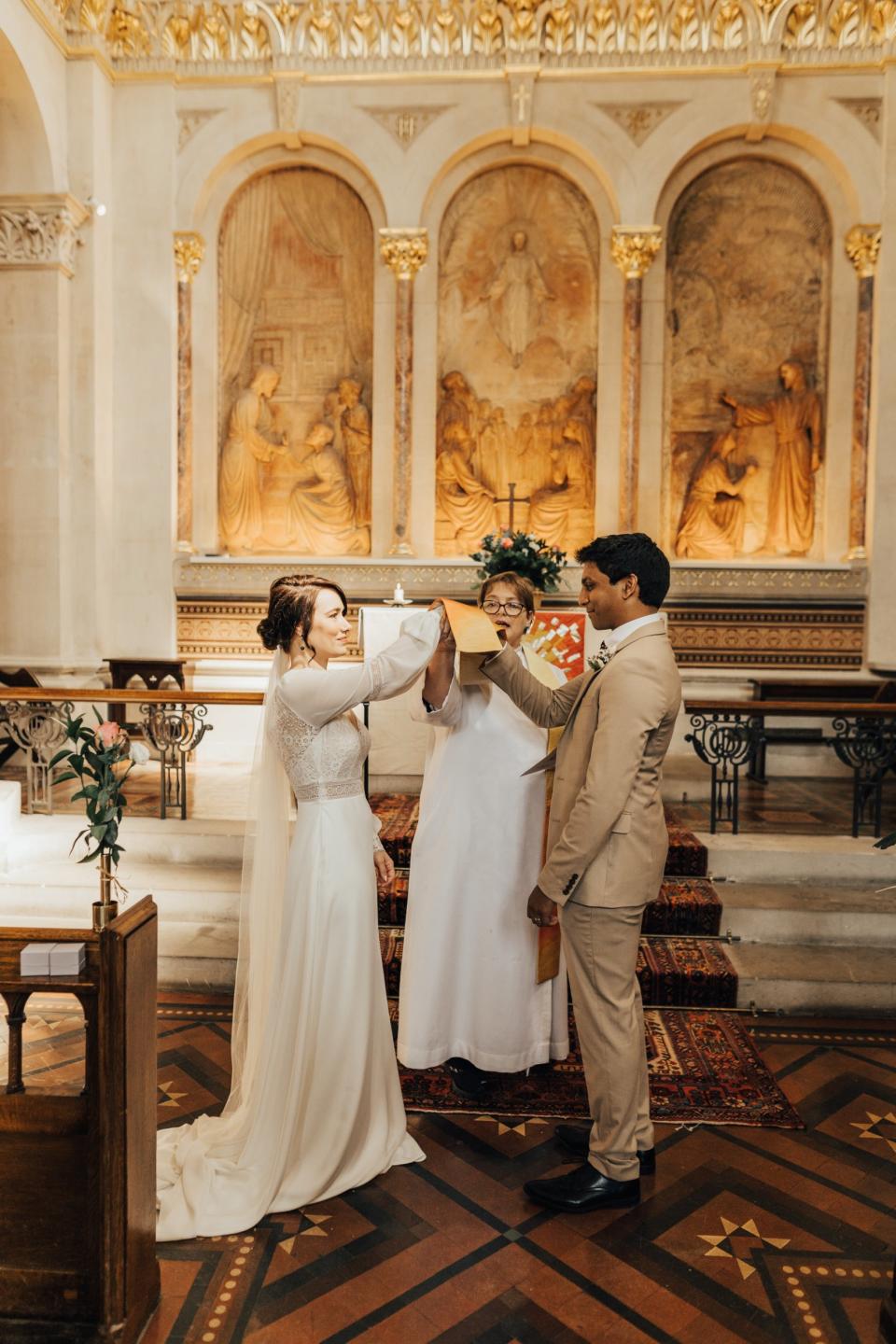 They live-streamed the service to allow family members to watch (Rebecca Carpenter Photography)