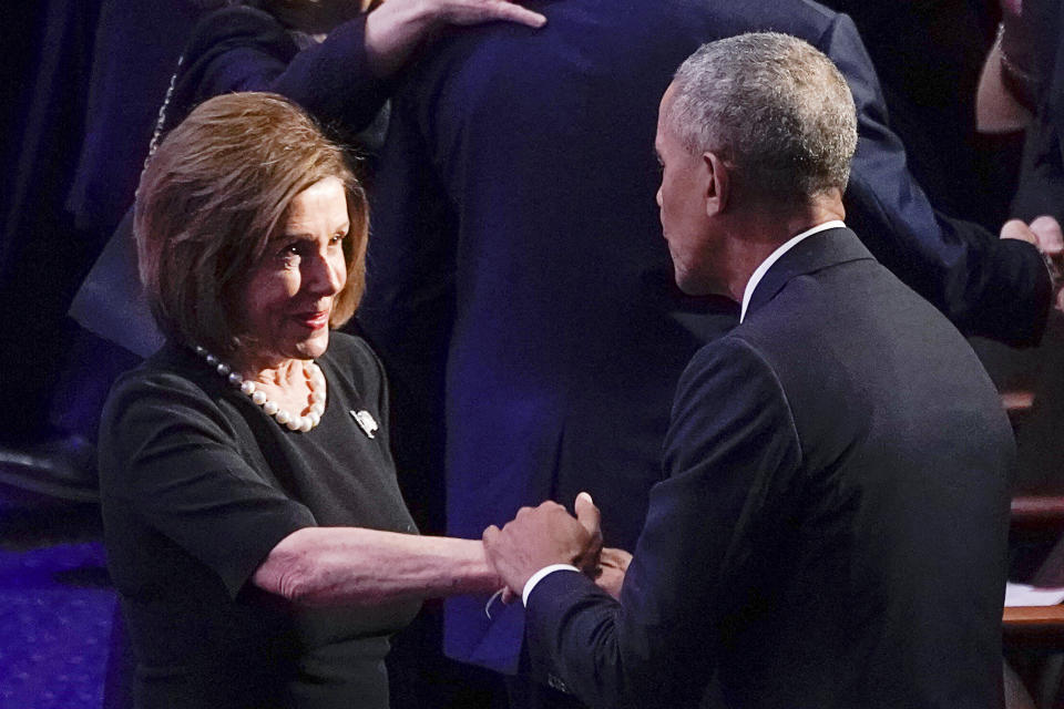 Former President Barack Obama greets House Speaker Nancy Pelosi, D-Calif., prior to the funeral services for Rep. Elijah Cummings, D-Md., at the New Psalmist Baptist Church in Baltimore, Md., on Friday, Oct. 25, 2019. (Joshua Roberts/Pool via AP)