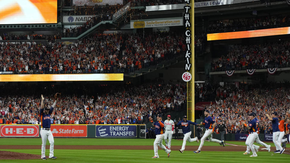The Houston Astros celebrate their 4-1 World Series win against the Philadelphia Phillies in Game 6 on Saturday, Nov. 5, 2022, in Houston. (AP Photo/David J. Phillip)