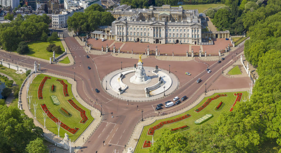 Note to eds: pixelation on Buckingham Palace rooftop as supplied from original source. An aerial view of two specially created 12 x 5 metre flowerbeds in front of Buckingham Palace in the Memorial Gardens in St James's Park as a tribute to the 72nd anniversary of the NHS. The letters are made up of 1,500 Begonia semperflorens 'Heaven White' plants in each bed, while the background is 21,000 plants of Echeveria imbricate, Senecio serpens and Sedum pachyclados.