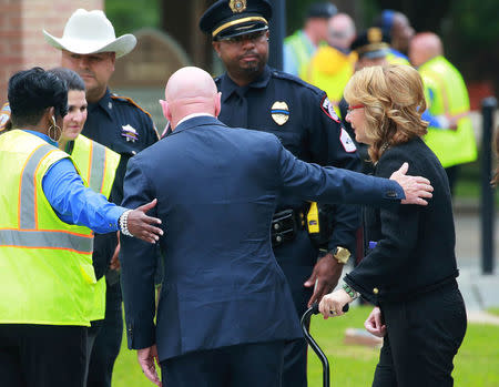 Former U.S. Congresswoman Gabrielle Giffords and husband Astronaut Mark Kelly arrive at the funeral service of former first lady Barbara Bush, at St. Martin's Episcopal Church in Houston, Texas, U.S., April 21, 2018. REUTERS/Richard Carson