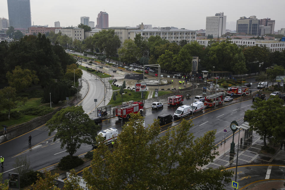 Turkish security forces and emergency teams cordon off an area near the Turkish Parliament and Interior Ministry after an explosion in Ankara, Sunday, Oct. 1, 2023. A suicide bomber detonated an explosive device in the heart of the Turkish capital, Ankara, on Sunday, hours before parliament was scheduled to reopen after a summer recess. A second assailant was killed in a shootout with police. (AP Photo/Ali Unal)