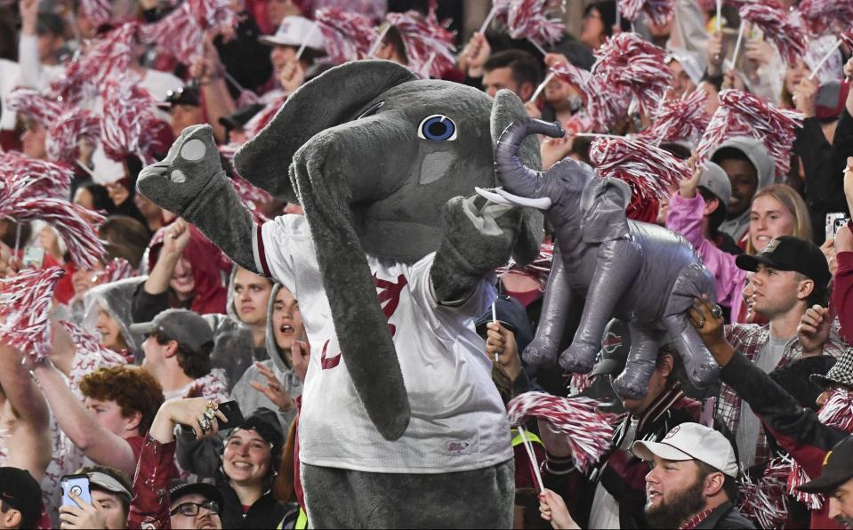 Nov 26, 2022; Tuscaloosa, Alabama, USA; Alabama Crimson Tide mascot Big Al stands in the student section and cheers during a game against the Auburn Tigers at Bryant-Denny Stadium. Alabama won 49-27. Mandatory Credit: Gary Cosby Jr.-USA TODAY Sports ORG XMIT: IMAGN-491483 ORIG FILE ID: 20221126_gma_wv4_1710.jpg