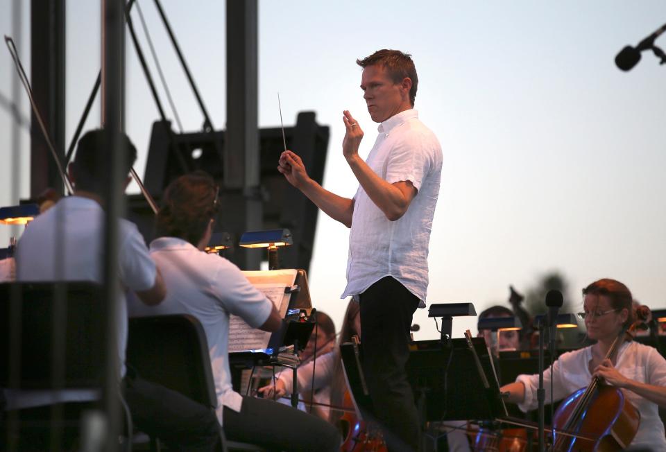 Alexander Mickelthwate conducts the Oklahoma City Philharmonic's Red, White and Boom! concert at the State Fair Park in Oklahoma City, Tuesday, July 3, 2018. For the second year, the 2022 OKC Philharmonic's Independence Day concert will be at Scissortail Park.