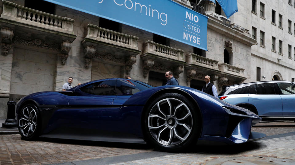 Chinese electric vehicle start-up Nio Inc. vehicles are on display in front of the NYSE on its stock debut. September 12, 2018. (PHOTO: REUTERS/Brendan McDermid)