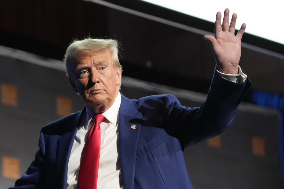 Republican presidential nominee former President Donald Trump waves as he departs a campaign event at the Economic Club of New York, Thursday, Sept. 5, 2024, in New York. (AP Photo/Alex Brandon)