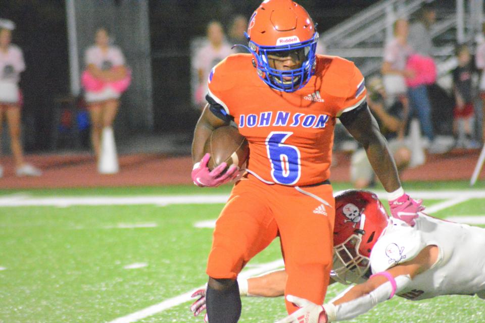 Johnson's Samari Dowdy breaks free from a Savannah Christian defender during Friday night's game. Savannah Christian won 14-6.