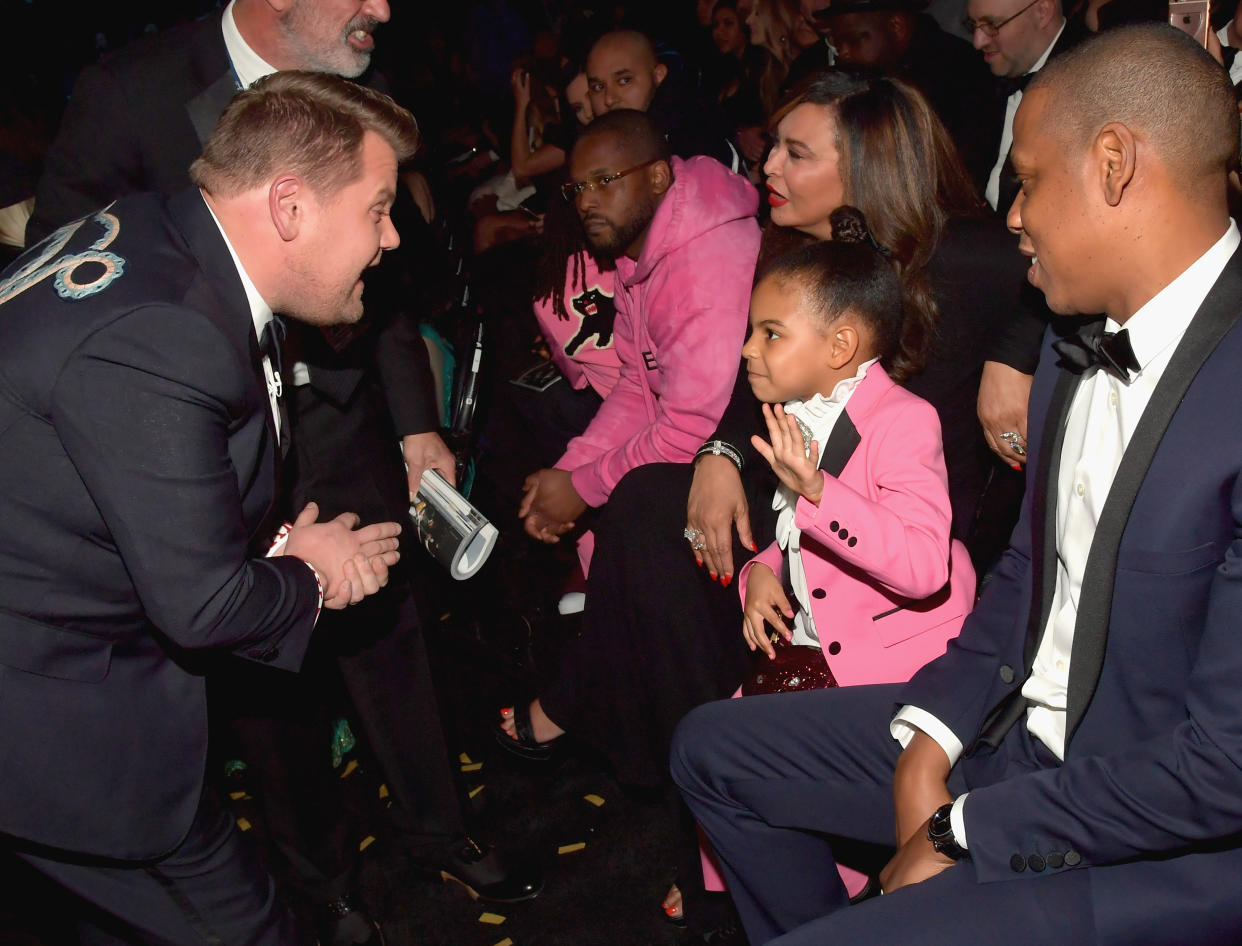 LOS ANGELES, CA - FEBRUARY 12: (L-R) Host James Corden, Blue Ivy Carter and rapper Jay Z during The 59th GRAMMY Awards at STAPLES Center on February 12, 2017 in Los Angeles, California.  (Photo by Lester Cohen/Getty Images for NARAS)