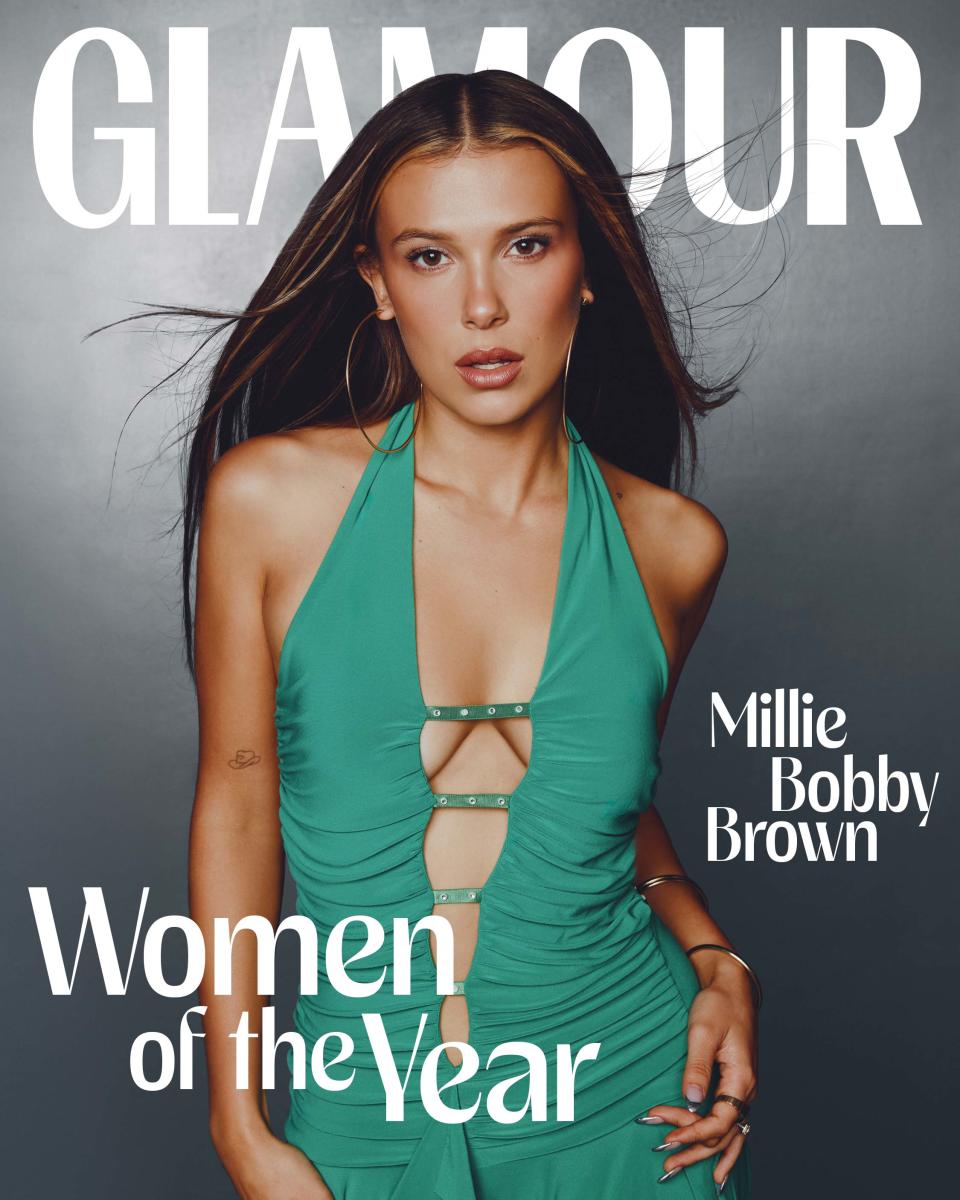 <cite class="credit">Millie Bobby Brown on the cover of *Glamour,* wearing vintage fashion throughout from the early 2000s. Roberto Cavalli dress from Depop.com. Jennifer Fisher earrings and bangles. Yvonne Leone ring. Jacquie Aiche ring.</cite>