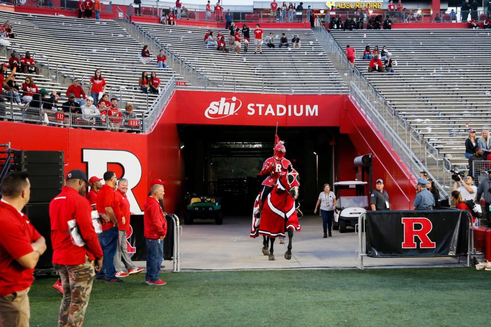 Few fans were there to cheer the Rutgers Scarlet Knight as he rode onto the field after a touchdown during the fourth quarter of Rutgers' home game on Oct. 2 against nationally-ranked Ohio State, who won 52-13.