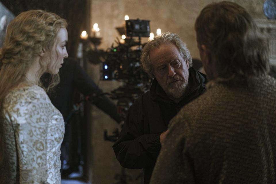 Jodie Comer, Ridley Scott, and Matt Damon behind the scenes of “The Last Duel” - Credit: Jessica Forde