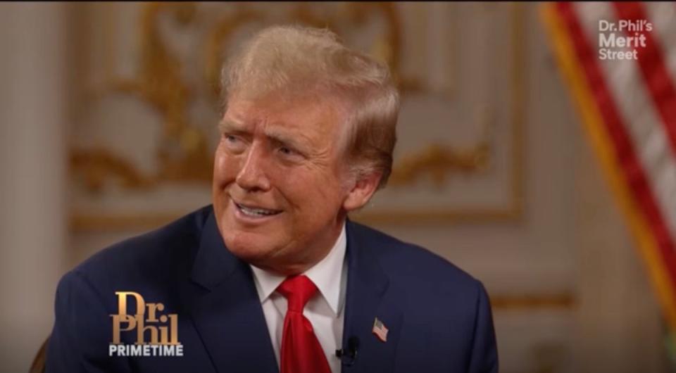 Donald Trump reacts during an interview with Dr Phil from Mar-a-Lago (Dr. Phil’s Merit Street)