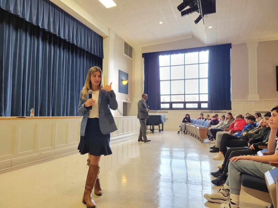 Supervising Assistant Prosecutor Samantha DeNegri (front) and Sgt. Patrick LaGuerre of the Morris County Prosecutor's Office aim to grab students' attention with an anti-bullying presentation in schools across the county.