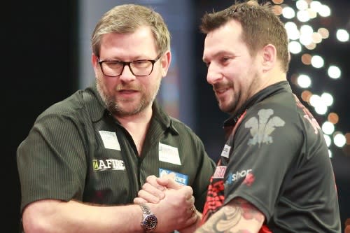 James Wade and Jonny Clayton in darts action