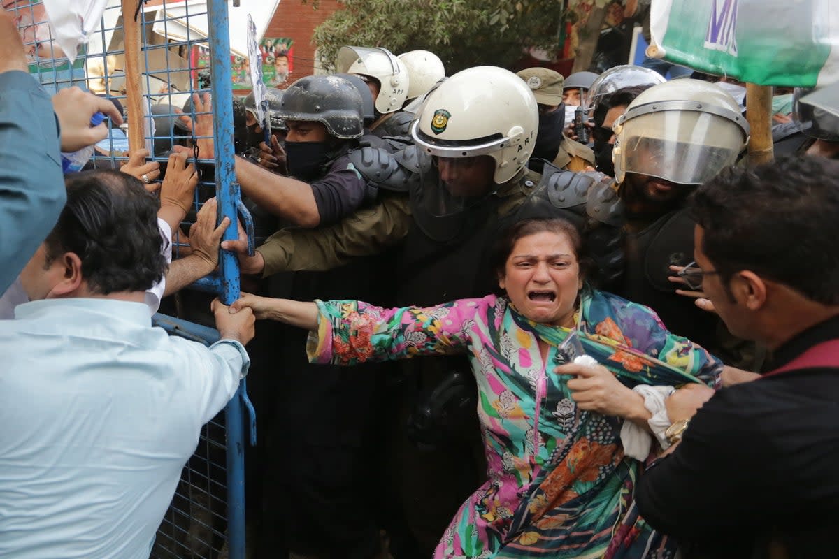 Supporters of Imran Khan clash with police (EPA)