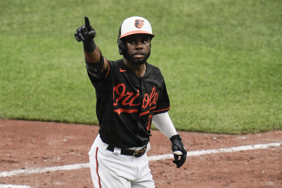 Baltimore Orioles' Cedric Mullins gestures after hitting a solo home run off Toronto Blue Jays starting pitcher Anthony Kay during the seventh inning of a baseball game, Saturday, June 19, 2021, in Baltimore. (AP Photo/Julio Cortez)