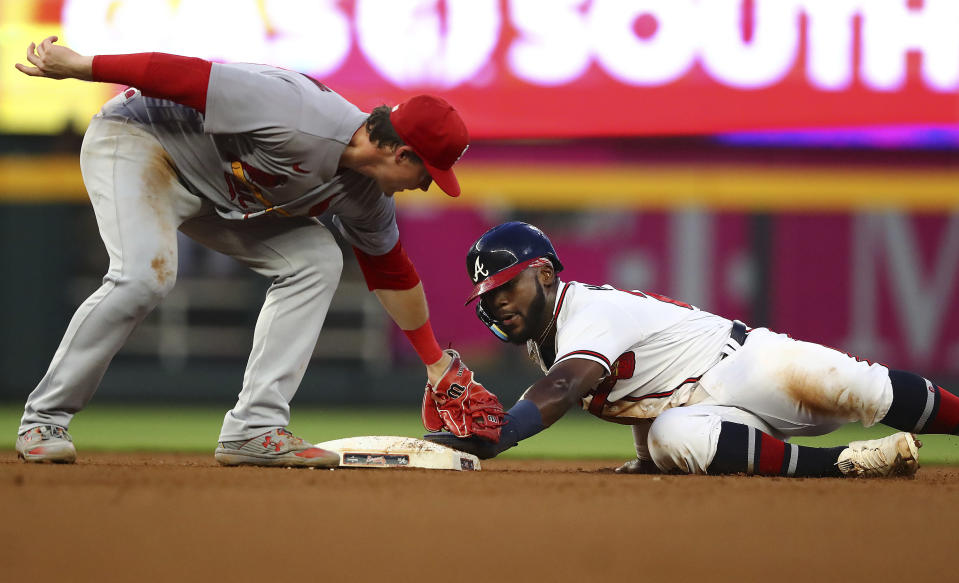 Atlanta Braves' Michael Harris steals second base past the tag of St. Louis Cardinals second baseman Nolan Gorman during the fourth inning of a baseball game Tuesday, July 5, 2022, in Atlanta. (Curtis Compton/Atlanta Journal-Constitution via AP)