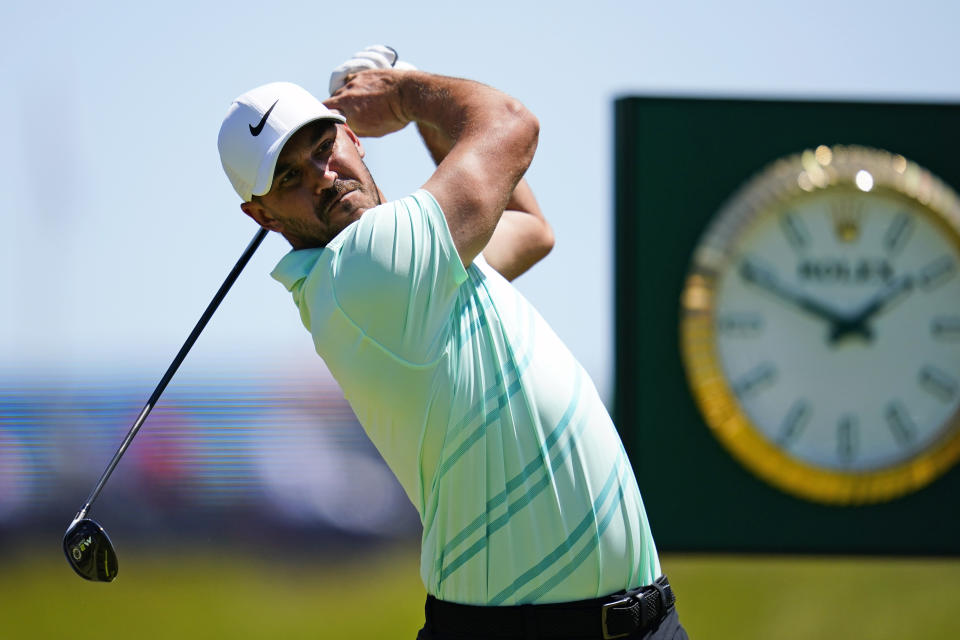 Brooks Koepka hits on the 13th hole during a practice round for the U.S. Open golf tournament at The Country Club, Wednesday, June 15, 2022, in Brookline, Mass. (AP Photo/Julio Cortez)