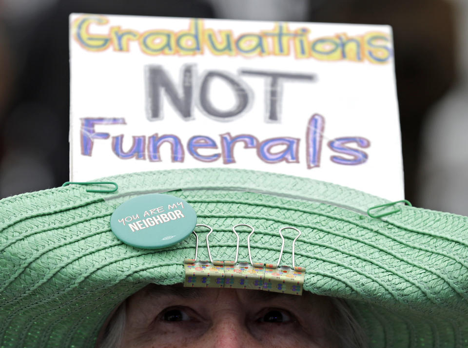 <p>A demonstrator attends a “March for Our Lives” rally in support of gun control, Saturday, March 24, 2018, in Chicago. (AP Photo/Nam Y. Huh) </p>